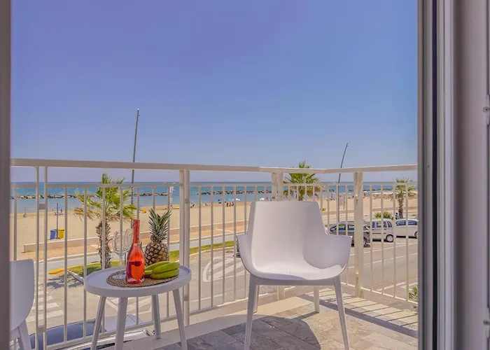 Beachfront With Ac & Private Parking By Hosthero * Civitanova Marche